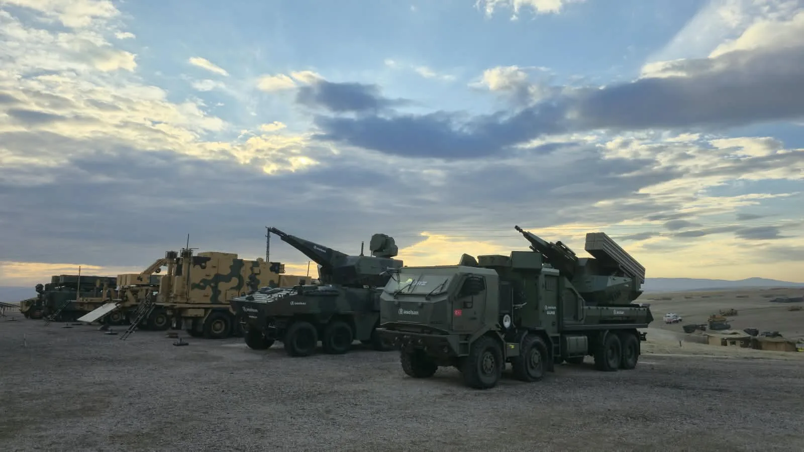 Air defence vehicles lined up at dusk during Ateş Serbest-2026 in Polatlı. Photo: Envanter Medya