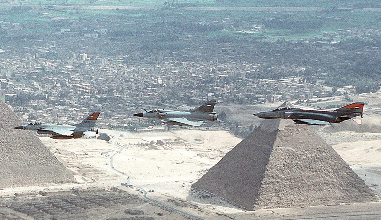 Egyptian Air Force F-16, Mirage 2000 and F-4 flying over the pyramids during Exercise Bright Star 1994