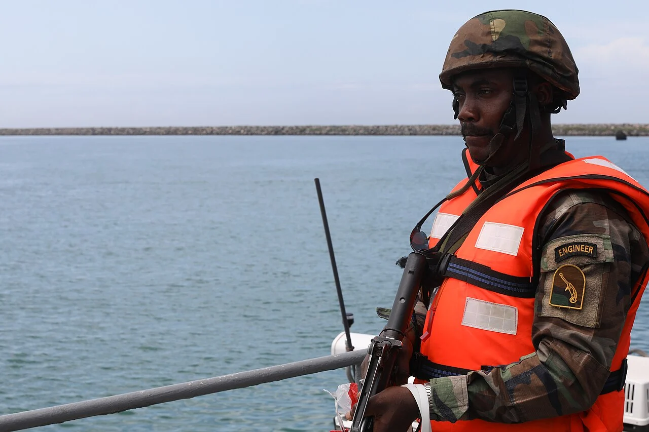 A Ghana Navy sailor aboard Boundary-class patrol ship GNS Half Assini during a maritime interdiction exercise