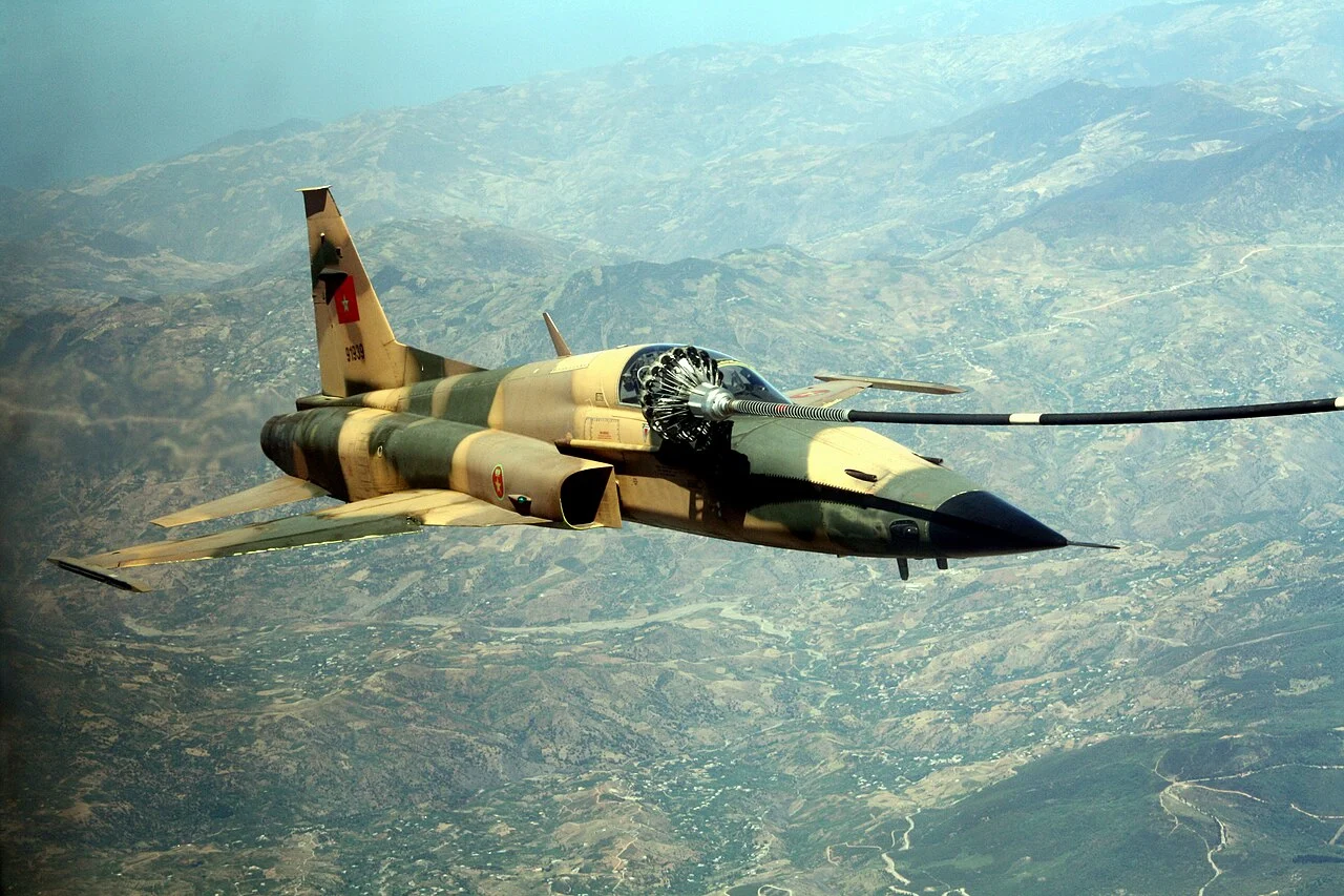 Royal Moroccan Air Force F-5 Tiger II jet refuels in flight during Exercise African Lion