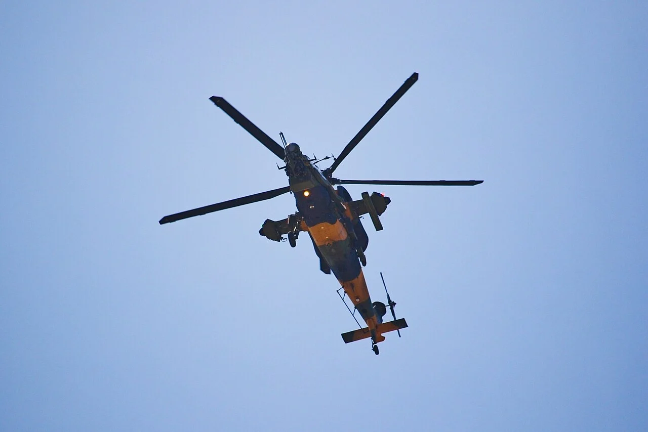 Newly delivered T129 ATAK helicopter of the Somali Air Force flying during a parade