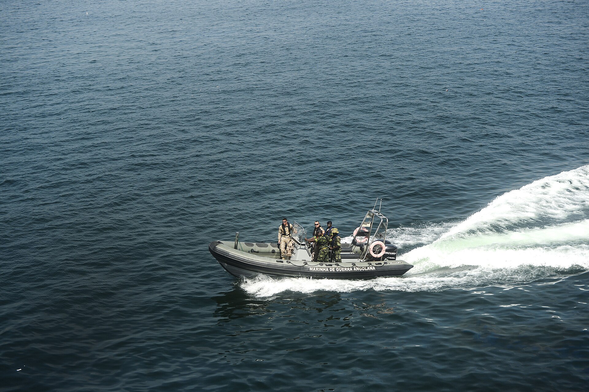 Angolan Navy rigid-hull inflatable boat marked Marinha de Guerra Angolana at speed off Luanda during Africa Partnership Station 2015